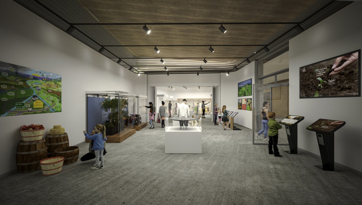 Image of a well lit gallery space with exhibitions