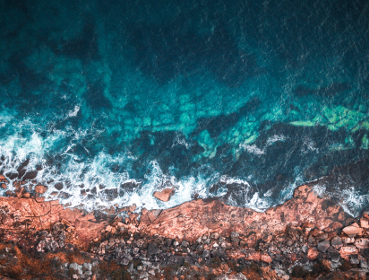 Image of shore line taken from directly above where the ocean meets the land
